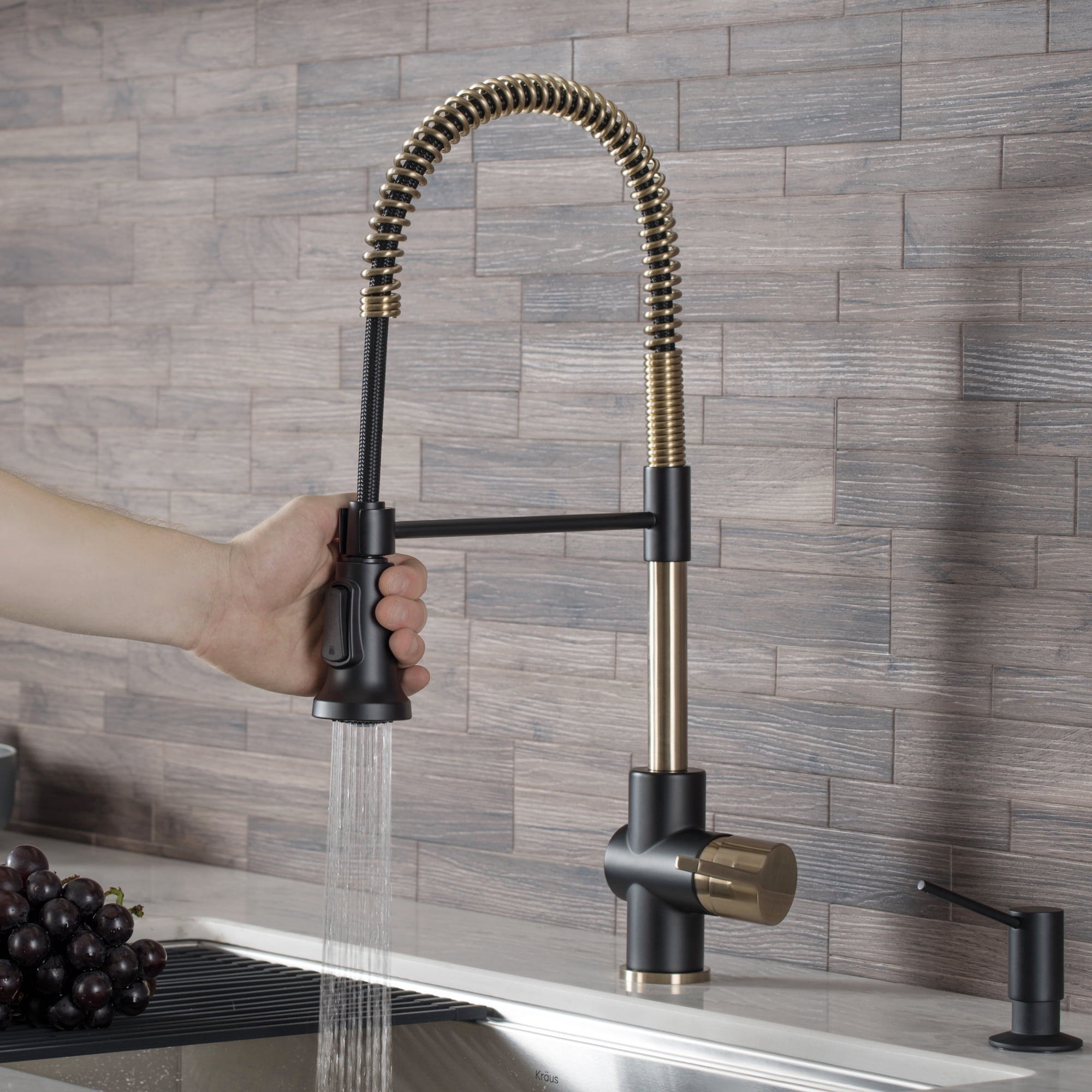 Kraus Britt Single Handle Commercial Kitchen Faucet with Dual Function Sprayhead In Brushed Gold/Matte Black