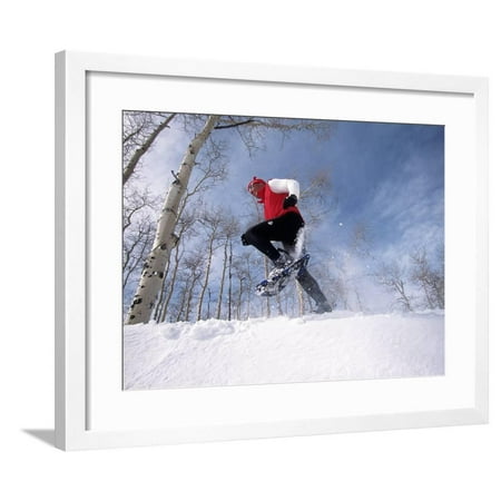 Man Running in Snowshoes Framed Print Wall Art By Jack