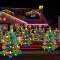 thumbnail image 3 of Qoosea 6 pack Solar Christmas Garden Stake Lights, Decorative Xmas Tree Solar Christmas Yard Stake Outdoor Waterproof Christmas Pathway Lights for Christmas Decoration Garden Patio Yard, 3 of 6