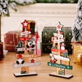 thumbnail image 1 of Centro de Mesa Navideño de Madera con Muñeco de Nieve y Papá Noel | Decoración Festiva | Material: Madera | Color: Rojo | 21 × 8,5 × 3,7 Cm | 30 G | Paquete de 1 Adorno, 1 of 6