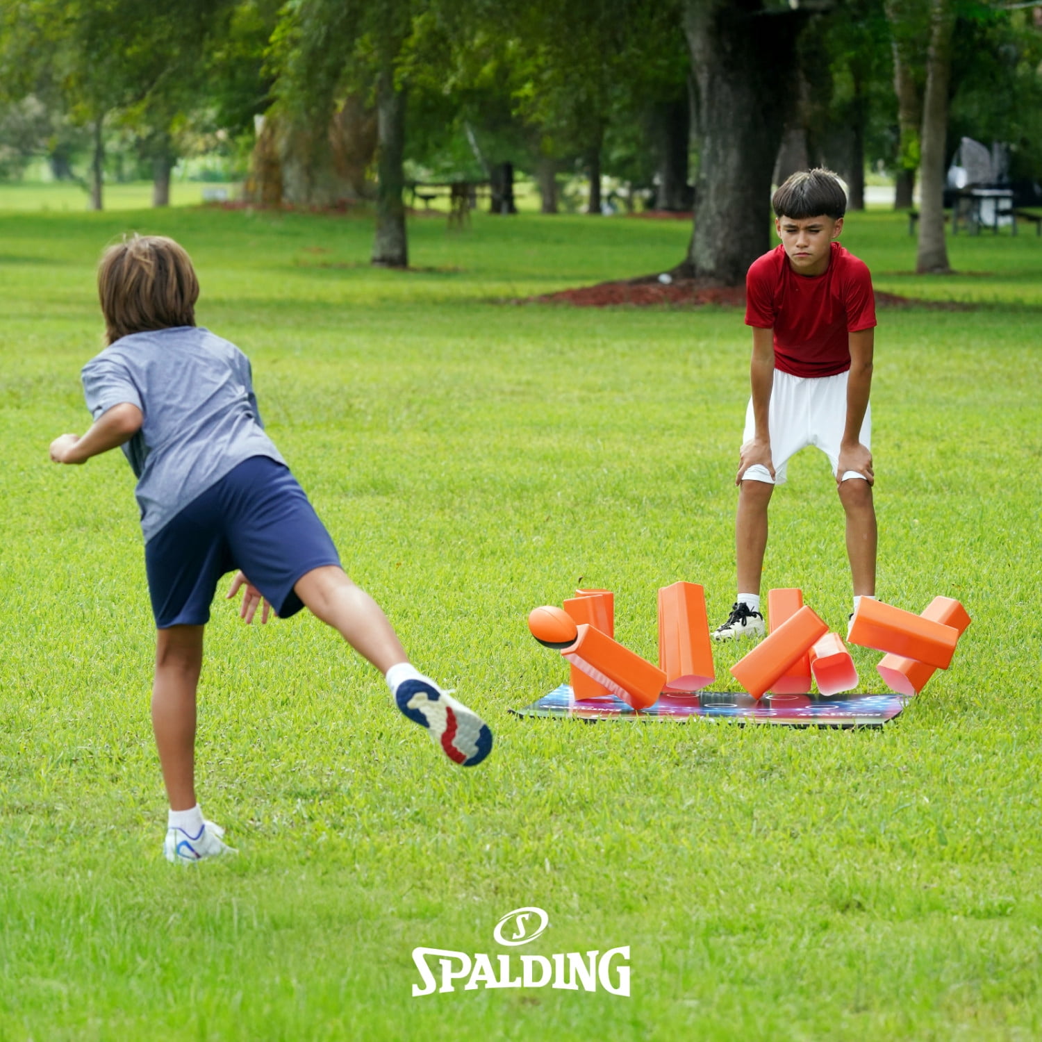 Spalding Football Pylon Toss Game, Easy-Grip Foam Football with Wooden Base & 10 Pins, Fun Backyard Target Challenge Set for All Ages, Great for Lawn, Beach, or Tailgate Play