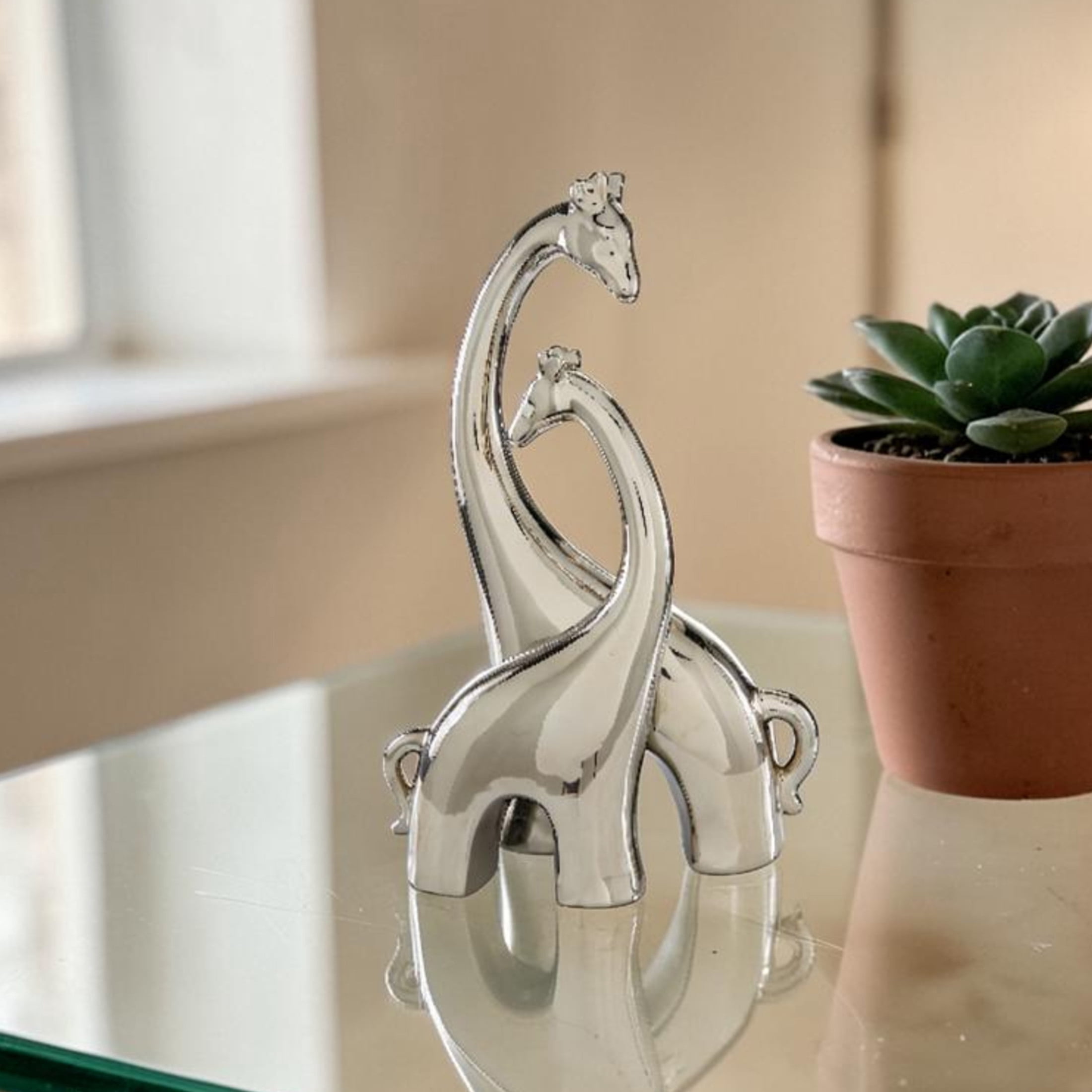 11" x 15" Silver Ceramic Giraffe Sculpture, by DecMode
