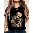 thumbnail image 1 of Women'S Cat & Skeleton Graphic Tee - Casual Crew Neck, Short Sleeve, Cool Summer T-Shirt with Whimsical Animal Print, Black, Casual Attire | Quirky Tshirt | Summer Fashion, 1 of 6
