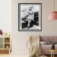 thumbnail image 3 of Historic Framed Print, [Claire May Fahy, full-length portrait, facing front, seated on outside tail of airplane], 17-7/8" x 21-7/8", 3 of 9
