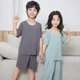 thumbnail image 3 of Novedad de verano, conjunto de ropa de dormir de seda helada para niños, ropa holgada de manga corta para el hogar para niños y niñas, conjunto de dos piezas, pijama cómodo, 3 of 5