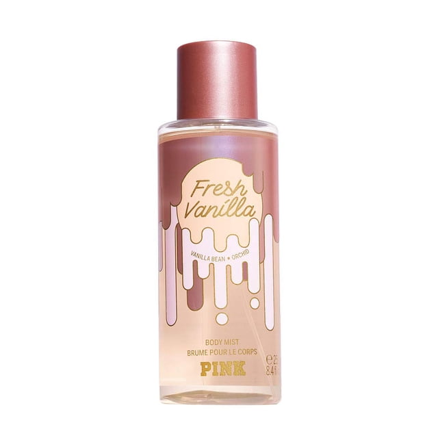 bruma corporal victoria's secret pink fresh vanilla 250 ml — Frontal view of a 250 ml clear plastic body mist bottle with a pink metallic cap. Gradient pink-to-peach label reads 'Fresh Vanilla' with a dripping-paint graphic, 'PINK' logo and 'Body Mist / Brume pour le corps' text. Often used as a light daily scent for skin and linen.