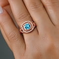 thumbnail image 4 of Gem Stone King 18K Rose Gold Plated Silver Swiss Blue Topaz and White Moissanite Ring for Women (2.06 Cttw, Gemstone Birthstone, Cushion Cut 6MM, Available in Size 5, 6, 7, 8, 9), 4 of 4