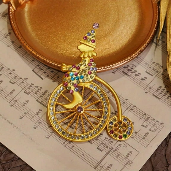 GKNET A cycling clown brooch in matte alloy with rhinestone
