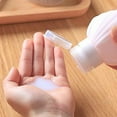 thumbnail image 1 of Ensemble de Bouteilles Distributrices en Silicone de Forme Portable pour Voyage, pour Usage Extérieur, Étanches, Solutions de Rangement pour Lotion, Shampooing et Cosmétiques de Voyage, Léger et Pratique, 1 of 3