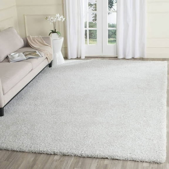 SAFAVIEH Ultimate Atanas Solid Plush Polyester Shag Area Rug, Silver/Ivory, 8' x 10'