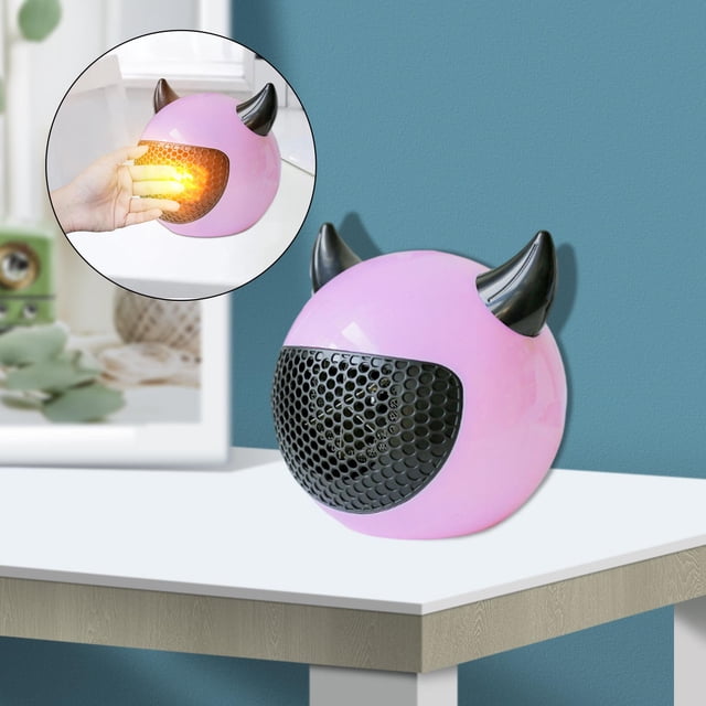 calentador de escritorio portátil calentador de espacio calentamiento rápido protección contra sobrecalentamiento calentador eléctrico silencios rosa — calentador de sobremesa compacto color rosa con carcasa ABS redondeada, rejilla frontal negra tipo panal y dos 'cuernos' negros en la parte superior; 400W, diseño portátil para escritorio y uso personal, a menudo usado también para calentar pequeñas áreas de trabajo.