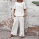 thumbnail image 2 of Traje pantalón liso con botones para mujer: conjunto de top de manga corta y pantalón con abertura, poliéster, estilo informal y elegante, tallas S-XXL, 2 of 5