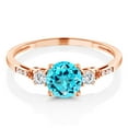 thumbnail image 3 of Gem Stone King 10K Rose Gold Swiss Blue Topaz White Created Sapphire & White Diamond Accent 3-Stone Engagement Ring for Women (1.04 Cttw, Round 6MM), 3 of 6