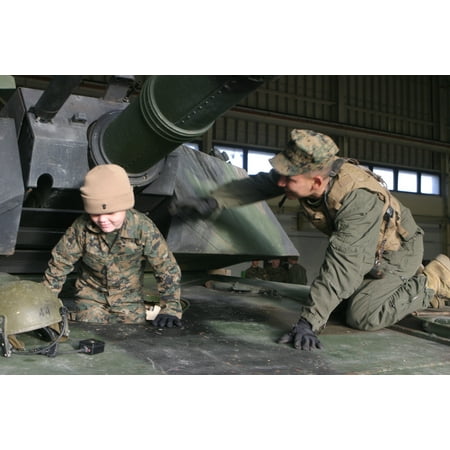 Canvas Print - Six-year-old Brandon Rasnick gets into the driver's seat of an M1A1 Abrams Battle Tank. Brandon ma Stretched Canvas 10 x