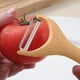 thumbnail image 4 of Pelador de verduras de acero inoxidable | Eficiente Zanahoria, Patata, Manzana, Fruta, Calabacín, Pepino | Mango ergonómico antideslizante de vetas de madera | Compacto 6.5"x2.4" | 1 Pieza | Fácil, 4 of 5