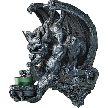 Design Toscano Whitechapel Manor Gargoyle Wall Sconce Imagine the drama when this menacing Gargoyle lowers his mysteriously flickering candlelight to illuminate your castle entryway. With bat-like wings  master Gargoyle artist chang s Intimidating fellow stoops from his gothic plinth in a sculpture full Of movement & imagination. Intricately sculpted  then cast in quality designer resin & hand-painted to resemble aged stone  thispiece can be found only at Toscano! Candle not included. 10 Wx11½  Dx13 H. 5 lbs.