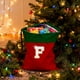 thumbnail image 1 of Bolsa de regalo navideña con cordón, 26 letras, poliéster rojo, 30 x 38 cm | Bolsa reutilizable para dulces navideños, pequeña bolsa para envolver regalos, organizador de decoración festiva, 1 of 6