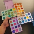 thumbnail image 1 of Paleta de sombras de ojos HUOGUO, 60 colores, amarillo neón, impermeable, 1 of 5