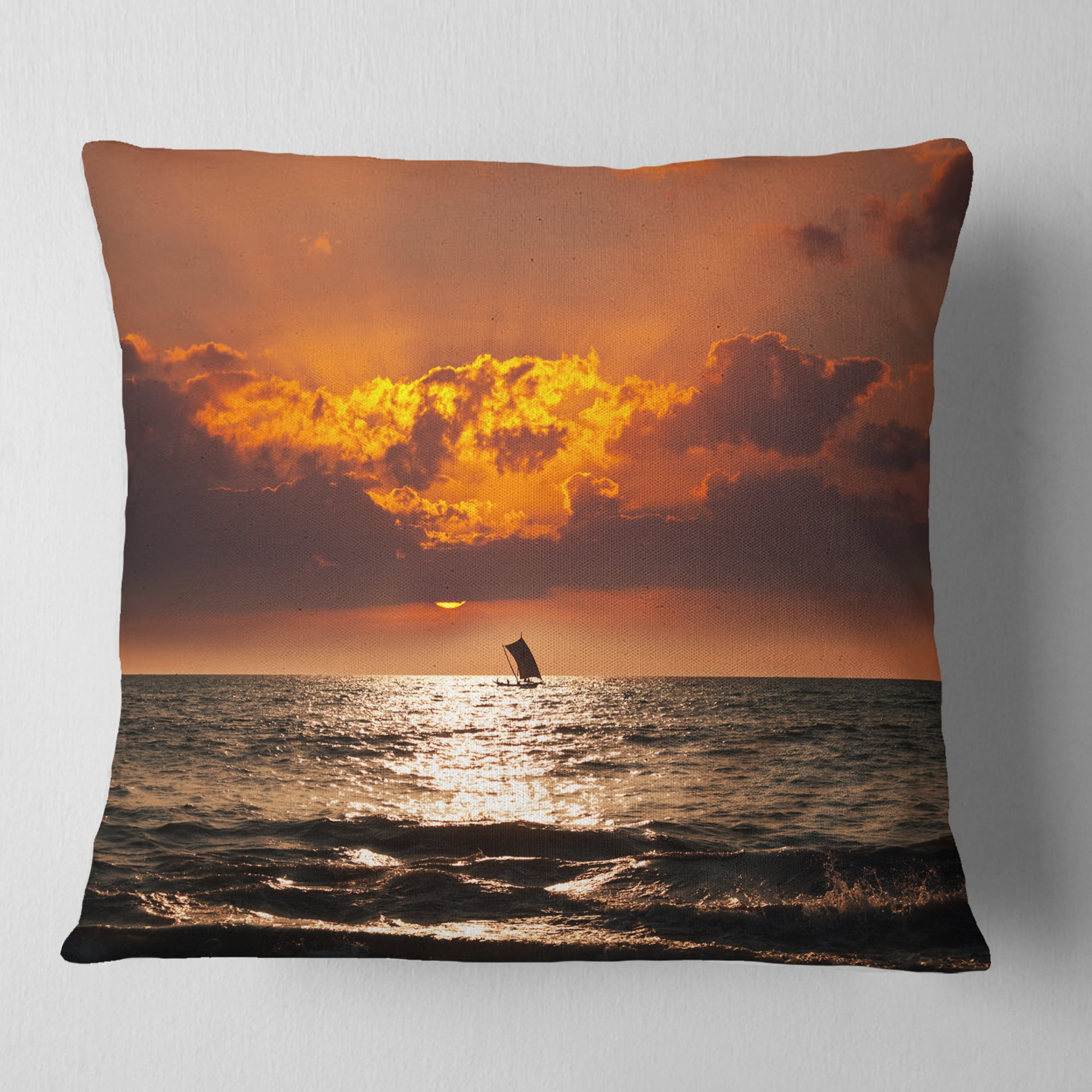 Designart Sunset Beach with Distant Sail Boat - Seashore Throw Pillow - 18x18