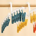 thumbnail image 4 of Yellow Laundry Drying Rack, Space Saving, Versatile, Anti-Drop, Plastic Sock Clips, Lightweight Drying Rack for Travel, 4 of 5