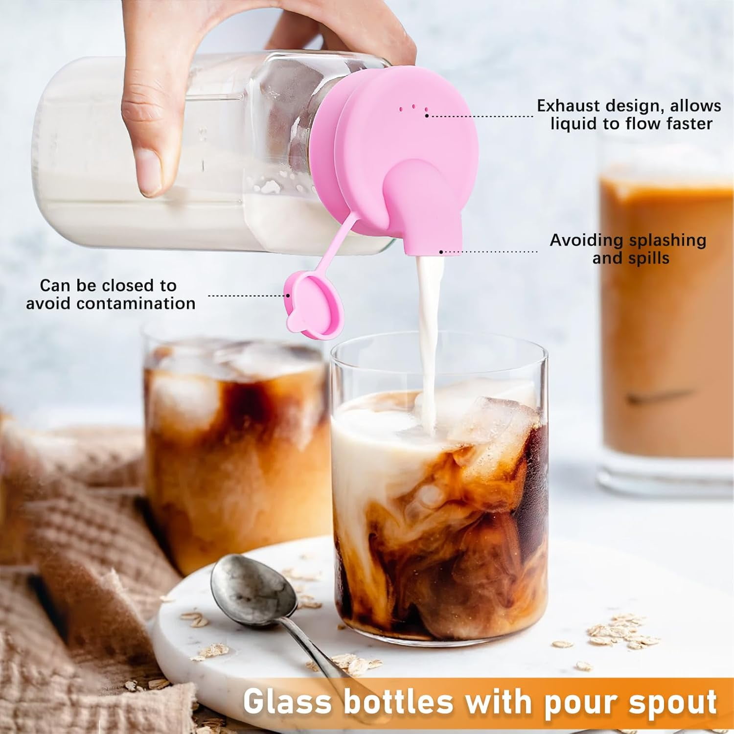 4-pack of 16 oz square glass baby bottles with silicone dispensing caps; glass juice bottles with screw caps; reusable with graduated markings; breast milk storage containers.