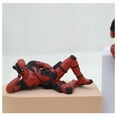 thumbnail image 1 of HUASHENG Model Pendant Men Lying Posture Hand Action Figure Holding Card Look Back Posture Surrounding Home Accessories, 1 of 5