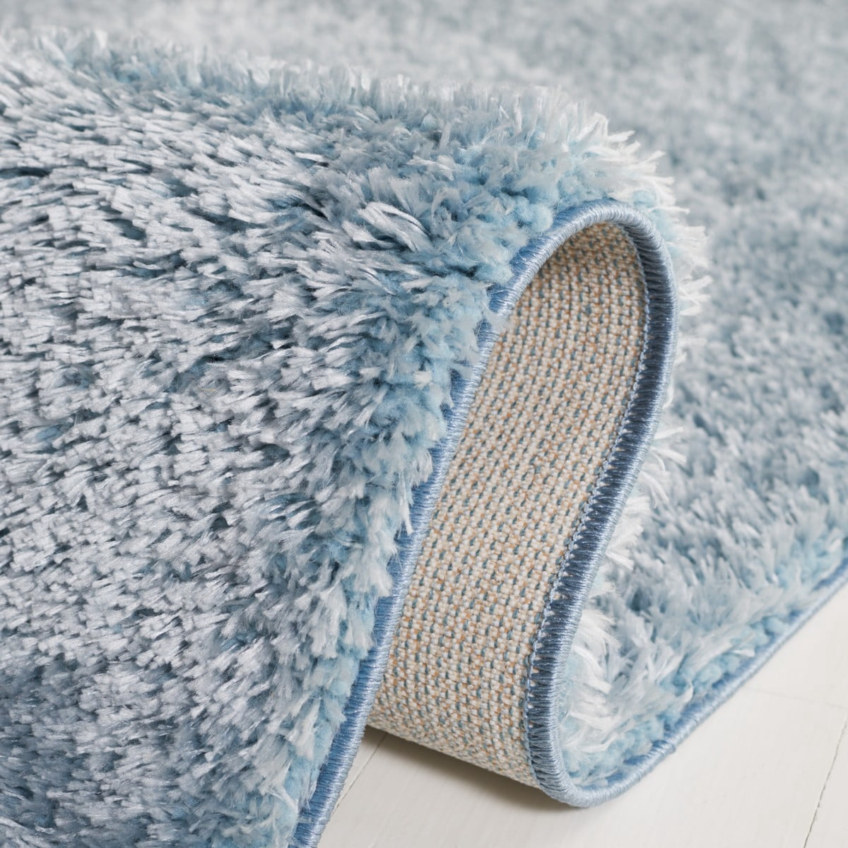 SAFAVIEH Tahoe Joey Modern Shag Area Rug, 5' x 7', Blue