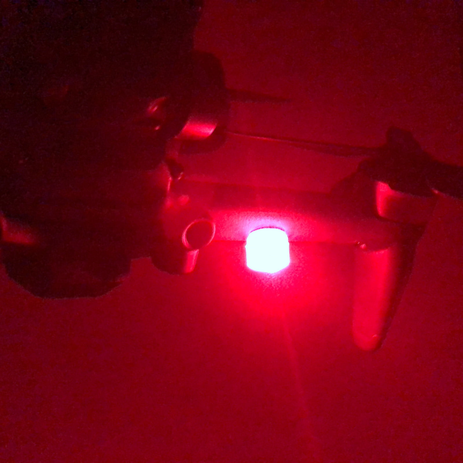 Drone with red shop and blue lights