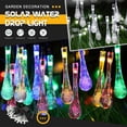 thumbnail image 1 of Fiudx Luces Solares En Forma de Gota de Agua, Luces Led de Bajo Consumo, 8 Modos de Iluminación, Decoraciones Impermeables para Exteriores, Perfectas para Fiestas, Bodas y Festividades, 6,5 M de Larg, 1 of 1