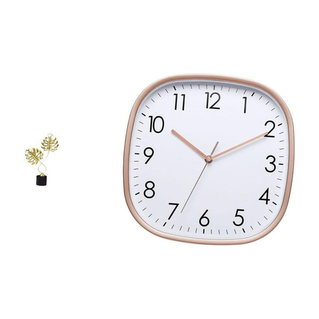 Reloj de pared digital con forma de hoja, ideal para dormitorio o sala de estar. Fabricado en hierro, madera y polipropileno. Movimiento de barrido si