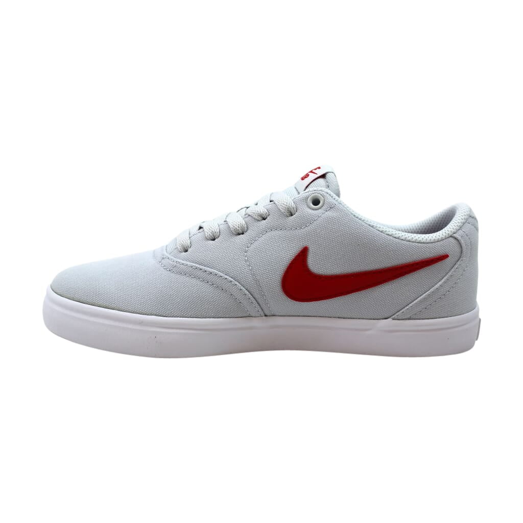 white nike shoes with red check