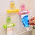 thumbnail image 2 of 1Pc Toothpaste Squeezer Rolling Toothpaste Dispenser Tube Squeezer Sucker Holder Hanger Gadget Tool, 2 of 5