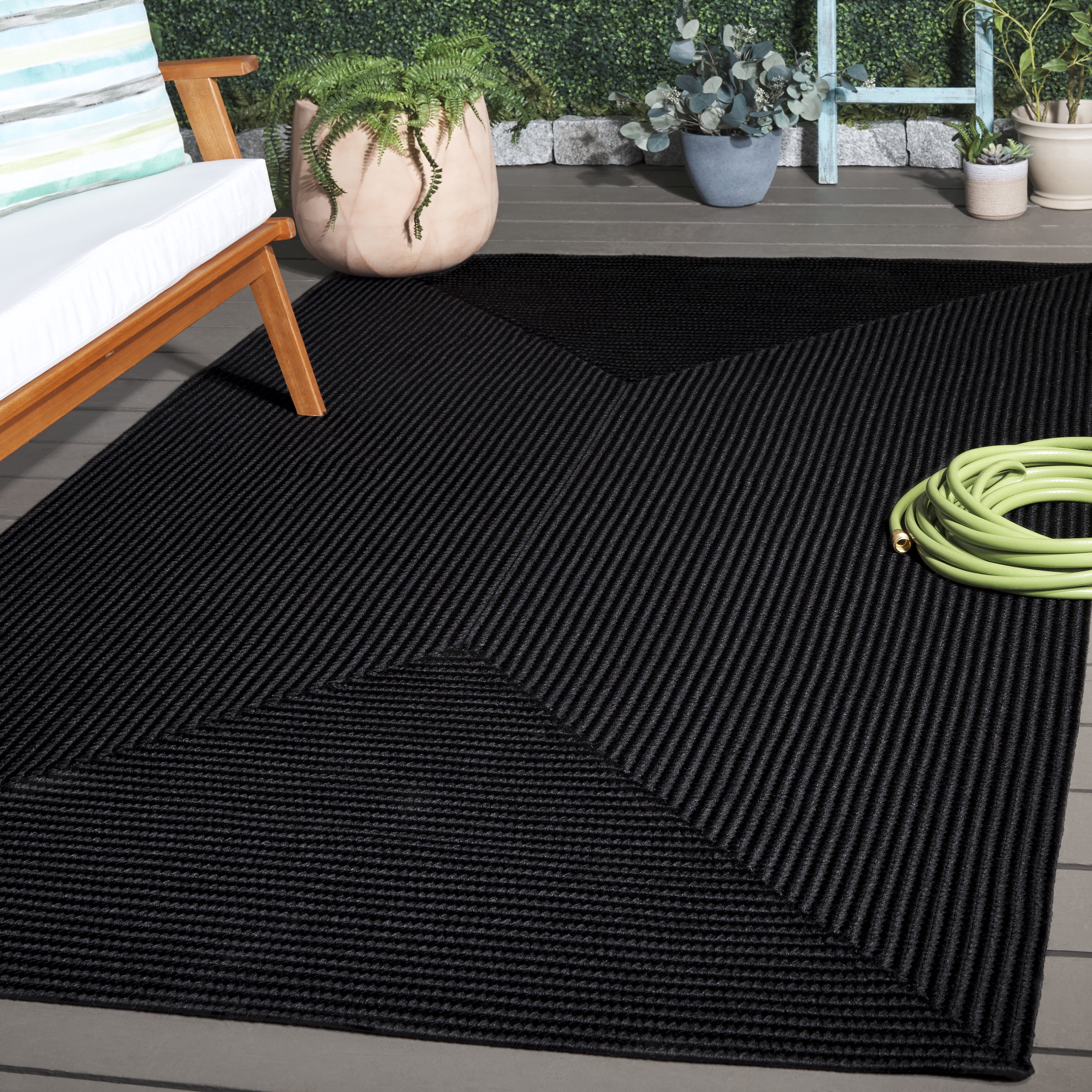 SAFAVIEH Braided Rishika Solid Machine Washable Reversible Area Rug, Black, 2' x 3'
