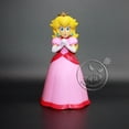 thumbnail image 1 of Marionetas coleccionables de Super Mario Bros para niños Luigi Yoshi Matkey Kong Wario Butter Modelo Juguetes Decoración de escritorio Regalos de Navidad 41 estilos zhangmengya LED, 1 of 2