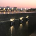thumbnail image 4 of Lámpara de pared solar de 4 piezas Luces de cerca de balcón a prueba de agua para exteriores (8 LED cálido), 4 of 9