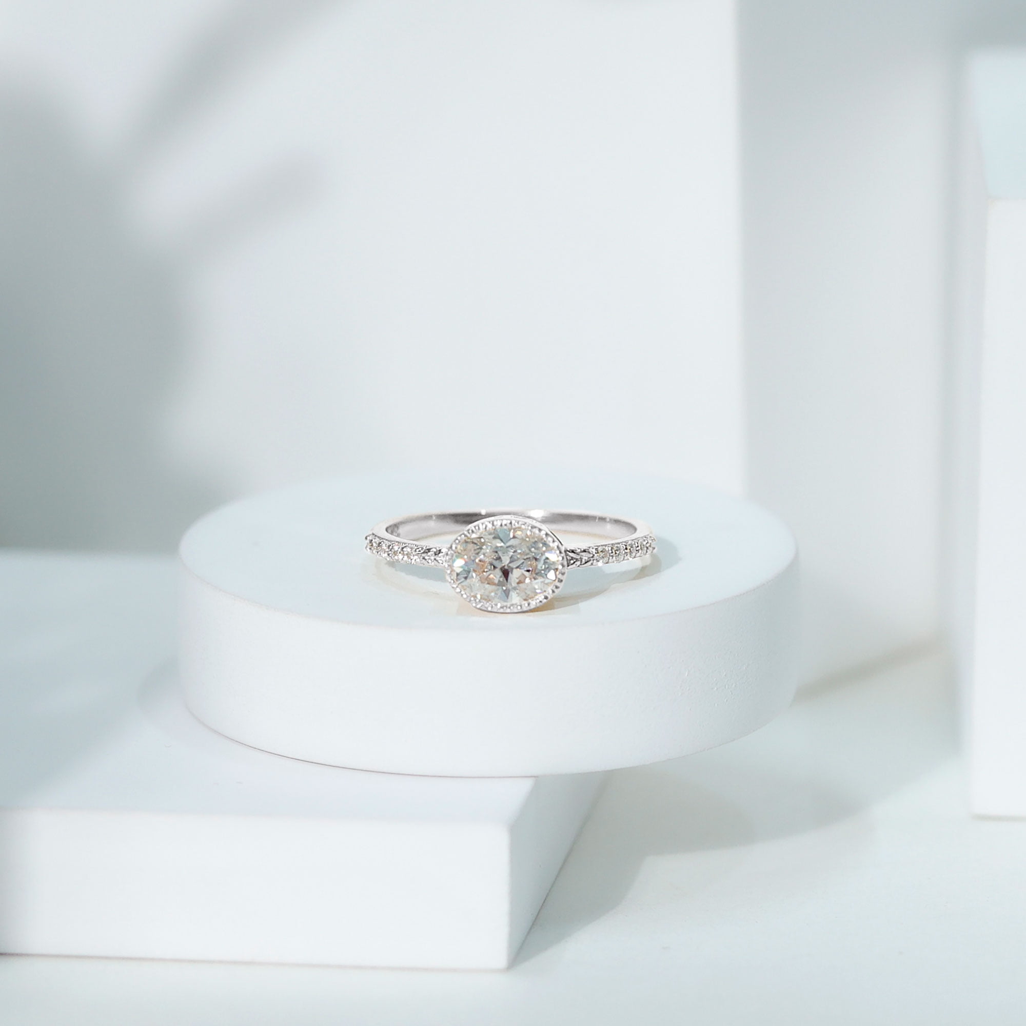 Rosec Jewels Moissanite Oval Engagement Ring 1 Carat - East West Ring for Women - 6X8 mm - D-VS1 Quality Certified, 14K White Gold, US 5.00