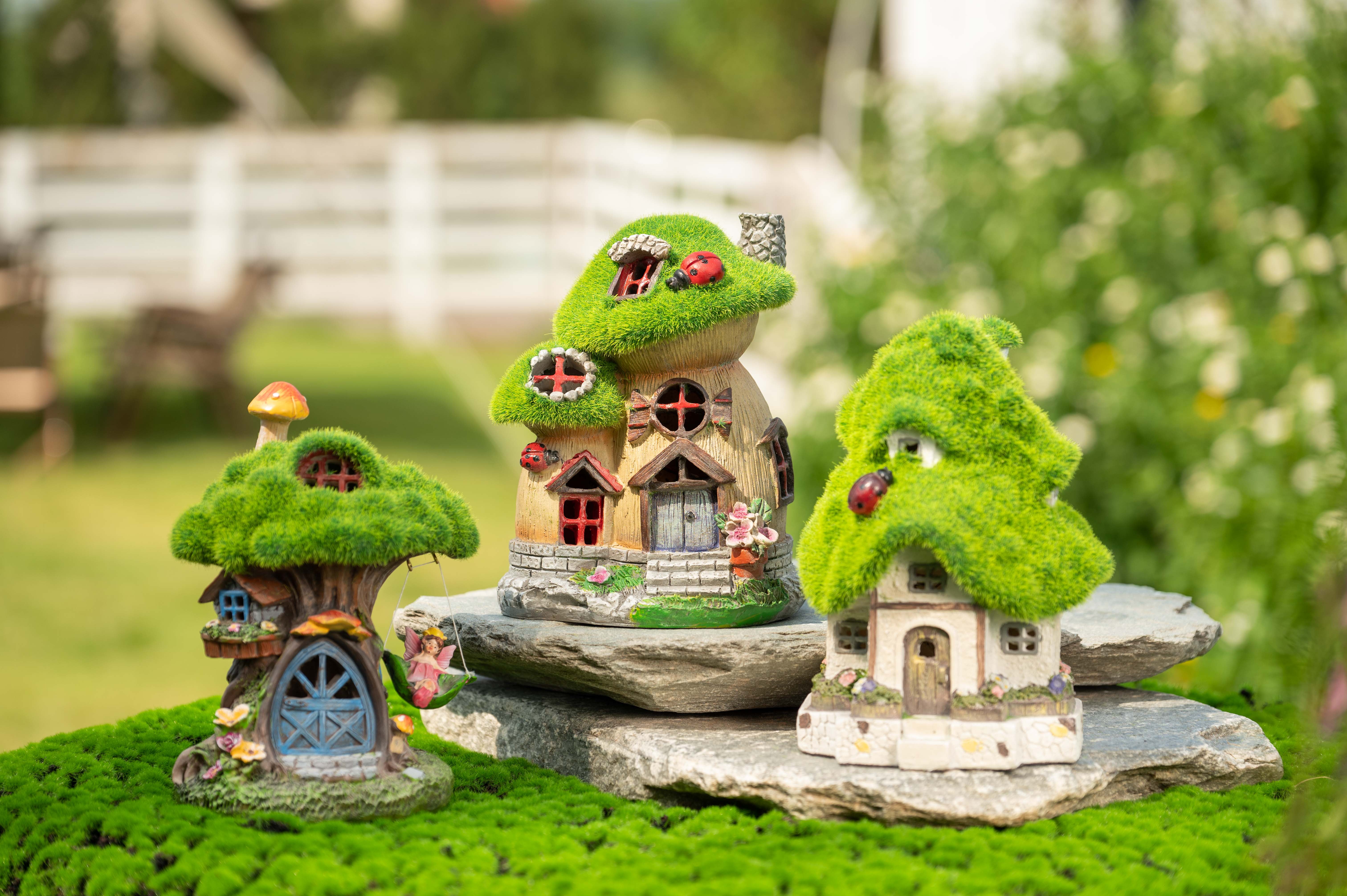 Teresa's Collections 7.9 inches Flocked Fairy House Garden Statues with Solar Lights, Resin Moss Outdoor Cottage Figurines with Fairy, Treehouse Lawn Ornaments for Patio Yard Decor