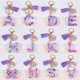 thumbnail image 1 of Llavero con 26 letras en inglés de estilo europeo y americano de moda, colgante con borlas y letras de piedra de color epoxi de cristal, 1 of 5