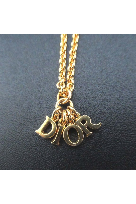 Pre-Owned Vintage Christian Dior logo charm necklace pendant in GP gold for women.