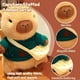 thumbnail image 3 of Peluche TITQWOP Capibara con 9 prendas y accesorios de 26 cm, 3 of 6