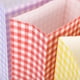 thumbnail image 4 of KAKOWELY 50 bolsas de fiesta a cuadros de colores para galletas, dulces y chocolates. Contenedor de dulces navideños para cumpleaños, bodas y festividades., 4 of 5