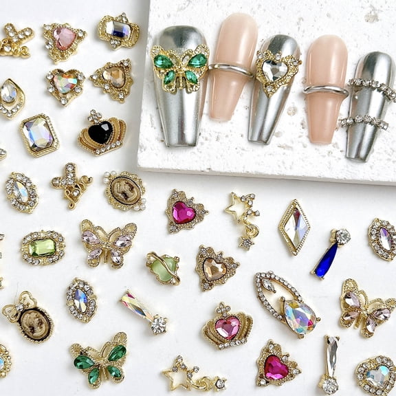 50PCS Simulated Creative Alloy Planet Butterfly Four-pointed Star Nail Charms 3D Light Luxury Exquisite Heart Crown Mixed Nail Art Decorations for DIY Y2K Cool Nails Designs