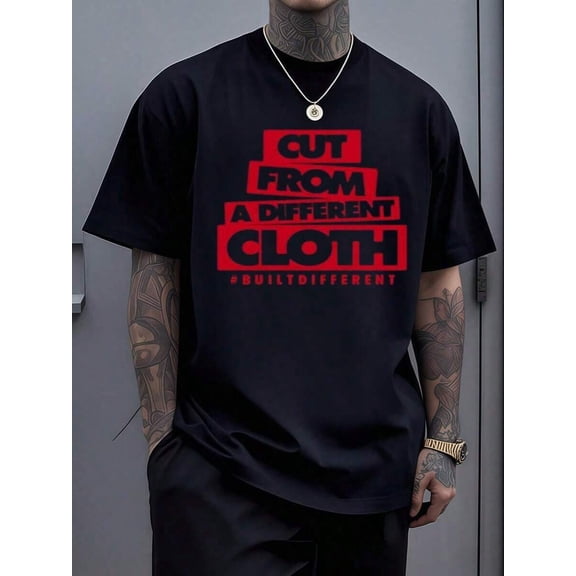 T-shirt with bold red text print that reads "Cut from a different cloth, different spirit" for men, 100% cotton, casual wear.