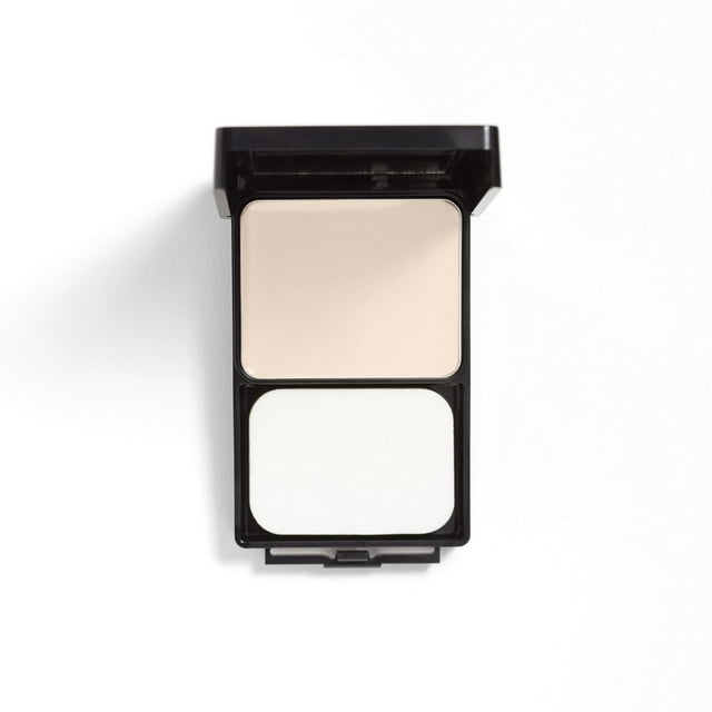 COVERGIRL Outlast Extreme Wear 3-in-1 Foundation compact with creamy beige foundation and white sponge applicator in a black case, oil and fragrance free, hypoallergenic, offering lightweight, matte, all-day coverage ideal for natural makeup looks.