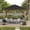 Black, variant on Sunjoy 13 ft. x 15 ft. Patio Cedar Framed Gazebo with Brown Steel and Polycarbonate Hip Roof Hardtop