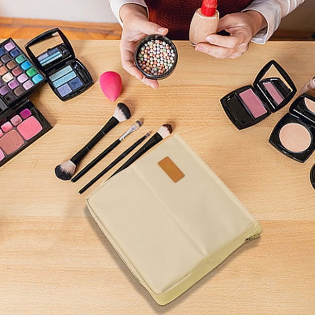 Neceser Sting de gran capacidad para cosméticos. Organizador para guardar brochas y accesorios de maquillaje. Diseño vertical con múltiples compartimentos. Ideal para viajes, tanto en casa como de