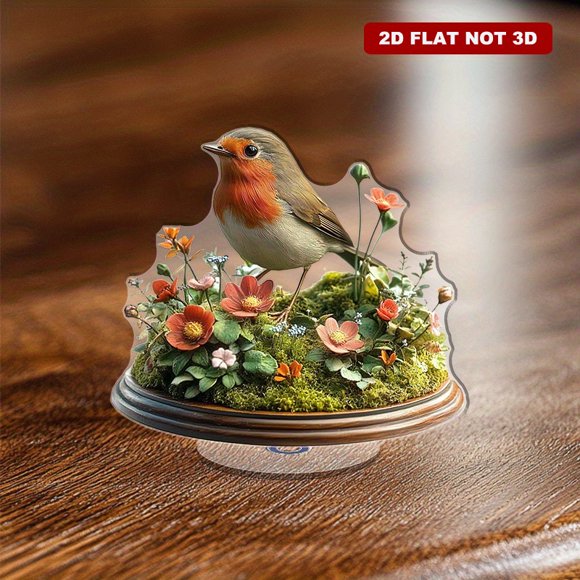 A rotating acrylic display featuring a vibrant Robin bird amidst a lush English garden with colorful flowers and mossy grounds on a white background