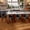 Black, variant on Genpo Swivel Counter Height Bar Stools Set of 4, 24 inch Brown Leather Kitchen Swivel Counter Stools with Backs, Wood Legs and Footrest, Bar Chairs for Kitchen Island