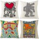 thumbnail image 1 of Funda de almohada de lino con estampado de grafiti de Keith Haring, 1 of 2