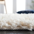 thumbnail image 4 of SAFAVIEH Collin Solid Plush Wool Shag Runner Rug, Ivory, 2'3" x 6', 4 of 8